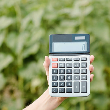 hand holding Calculator