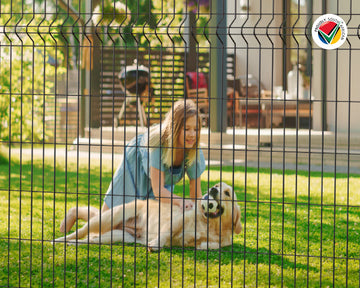 Thumbnail lady and dog behind fence